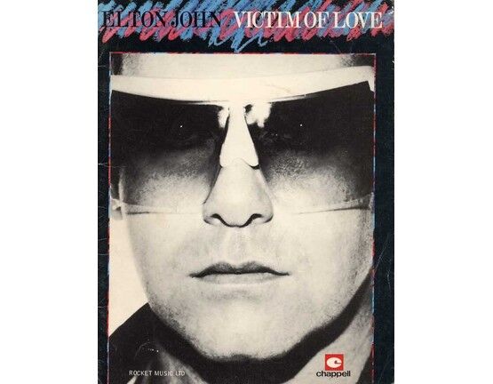 4727 | Elton John - Victim of Love - For Voice and Piano with Guitar Tab - Featuring Elton John