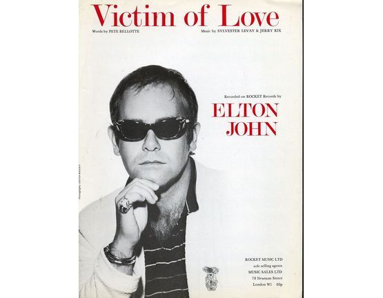 9788 | Victim of Love - Recorded on Rocket Records by Elton John - For Piano and Voice with Guitar chord symbols